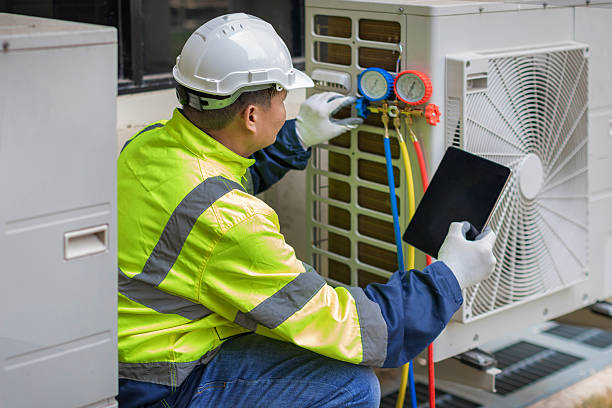 Professional Air Duct Cleaning technician working in Malcom, IA
